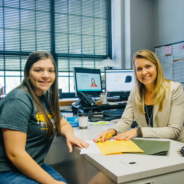 student and staff working together on undergraduate programs